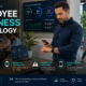 Employee using fitness tech and workplace wellness technology in a modern office environment