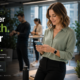 Office worker using a mobile fitness app to track health goals and daily activity